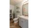 Bathroom featuring vanity, mirror, shelving, and updated fixtures at 13434 W Rovey Ave, Litchfield Park, AZ 85340