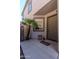 Inviting front porch featuring neutral color scheme, welcome sign, and a cozy seating area at 13434 W Rovey Ave, Litchfield Park, AZ 85340