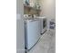 Modern laundry room features newer washer and dryer at 13434 W Rovey Ave, Litchfield Park, AZ 85340