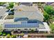 Stunning aerial shot of the home featuring solar panels on the roof and well-maintained landscaping at 14897 W Valentine St, Surprise, AZ 85379