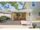 Back patio with pergola, outdoor seating, and a BBQ grill is great for entertaining at 14897 W Valentine St, Surprise, AZ 85379