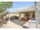 Landscaped back yard with patio and outdoor decor is perfect for enjoying the Arizona weather at 14897 W Valentine St, Surprise, AZ 85379