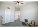 This is an empty bedroom with neutral walls and carpet at 14897 W Valentine St, Surprise, AZ 85379