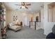 Open living space with lots of light and a staircase at 14897 W Valentine St, Surprise, AZ 85379
