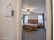 Cozy main bedroom with a wooden bed frame, soft carpet, and tranquil decor, creating a peaceful retreat at 14897 W Valentine St, Surprise, AZ 85379