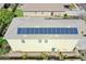 Aerial view of home highlighting full solar panel coverage and well-maintained backyard at 14897 W Valentine St, Surprise, AZ 85379