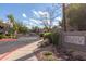 Landscaped entrance to Villages North with gated access at 15225 N 100Th St # 1209, Scottsdale, AZ 85260