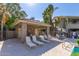 Relaxing poolside lounge area featuring seating and shade for ultimate outdoor comfort at 15225 N 100Th St # 1209, Scottsdale, AZ 85260