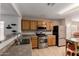 View of the kitchen featuring stainless steel appliances, and wood cabinets at 16261 W Custer Ln, Surprise, AZ 85379