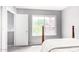 Cozy bedroom with great window view, light gray walls and plush carpet at 1633 E Lakeside Dr # 48, Gilbert, AZ 85234