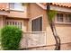 Exterior view of property with neutral stucco and tile roof at 1633 E Lakeside Dr # 48, Gilbert, AZ 85234