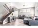 Bright living room with high ceilings, plenty of natural light, and staircase access at 1633 E Lakeside Dr # 48, Gilbert, AZ 85234