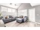 Bright living room with high ceilings, plenty of natural light, and comfortable seating at 1633 E Lakeside Dr # 48, Gilbert, AZ 85234