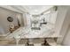 Kitchen with stainless steel sink and barstool seating at a granite countertop at 16427 W Labyrinth Ln, Surprise, AZ 85374