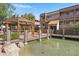 A charming community gazebo overlooks a serene pond, creating a peaceful and inviting outdoor space at 1645 W Baseline Rd # 2125, Mesa, AZ 85202