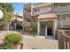 Exterior view of a well-maintained residence with charming architectural details and easy access to exterior entry at 1645 W Baseline Rd # 2125, Mesa, AZ 85202