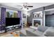 A cozy living room with fireplace and television offers a comfortable relaxation area at 1645 W Baseline Rd # 2125, Mesa, AZ 85202