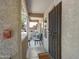 A welcoming porch featuring seating, a colorful rug, and a secure entry door at 1645 W Baseline Rd # 2125, Mesa, AZ 85202