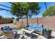 Cozy patio area featuring stylish outdoor furniture and a pergola at 16820 N 152Nd Ln, Surprise, AZ 85374