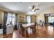Cozy dining room with tile flooring, neutral paint, large windows, and simple decor at 16820 N 152Nd Ln, Surprise, AZ 85374