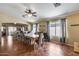 Bright dining room with tile flooring, large windows, modern light fixture, and neutral wall color at 16820 N 152Nd Ln, Surprise, AZ 85374