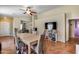 Inviting dining area with tile floors, modern lighting, and an open layout perfect for entertaining at 16820 N 152Nd Ln, Surprise, AZ 85374