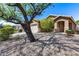 Attractive single-story home with a well-manicured front yard and mature landscaping at 16820 N 152Nd Ln, Surprise, AZ 85374