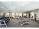 Community gym featuring a full complement of free weights and weight machines at 1701 E Colter St # 488, Phoenix, AZ 85016