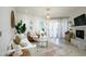 Spacious living room with modern decor, an open floor plan, and natural light at 1701 E Colter St # 488, Phoenix, AZ 85016