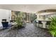Welcoming lobby area with comfortable seating, fireplace, and a bar at 1701 E Colter St # 488, Phoenix, AZ 85016
