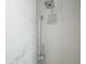 Walk-in shower featuring a hand shower, rainfall shower head, and marble tile surround at 1701 E Colter St # 488, Phoenix, AZ 85016