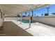 Inviting covered patio overlooking a backyard pool, perfect for outdoor relaxation and entertaining at 1920 N Cavalier Dr, Tempe, AZ 85288