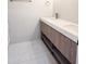 Elegant bathroom featuring a double vanity with quartz countertop and modern fixtures at 1920 N Cavalier Dr, Tempe, AZ 85288