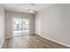 A bedroom featuring a sliding glass door to the pool and a ceiling fan at 1920 N Cavalier Dr, Tempe, AZ 85288