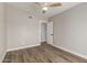 A bedroom featuring a closet and ceiling fan at 1920 N Cavalier Dr, Tempe, AZ 85288
