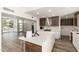 Modern kitchen with island, stainless steel appliances, and sleek cabinetry at 1920 N Cavalier Dr, Tempe, AZ 85288