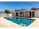 Backyard featuring an in-ground pool and a covered patio area at 1920 N Cavalier Dr, Tempe, AZ 85288