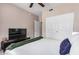 Comfortable bedroom featuring a ceiling fan and lots of natural light at 19700 N 76Th St # 1151, Scottsdale, AZ 85255