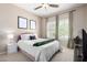 Cozy bedroom with a comfy bed, natural light, and neutral decor at 19700 N 76Th St # 1151, Scottsdale, AZ 85255
