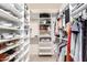 Walk-in closet with custom shelving and plenty of storage space at 19700 N 76Th St # 1151, Scottsdale, AZ 85255