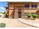 Charming two-story home featuring stone accents, a tiled roof, and well-maintained landscaping at 19700 N 76Th St # 1151, Scottsdale, AZ 85255