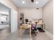 Bright office space with carpeted floors, natural light, and functional work space at 19700 N 76Th St # 1151, Scottsdale, AZ 85255