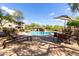 Inviting community pool area with comfortable lounge chairs and shaded seating, perfect for relaxation at 19700 N 76Th St # 1151, Scottsdale, AZ 85255