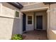 Inviting entryway with a brick-paved porch and dual front doors for added convenience at 20233 E Maya Rd, Queen Creek, AZ 85142