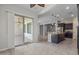 Open kitchen concept with stainless steel appliances, an island and connection to outdoor living at 20233 E Maya Rd, Queen Creek, AZ 85142