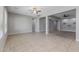 Bright living space with tile floors, neutral paint, and a ceiling fan for comfortable living at 20233 E Maya Rd, Queen Creek, AZ 85142