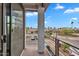 View from a balcony overlooking the neighborhood with sidewalks, greenery, parking, and surrounding apartments at 2090 S Dorsey Ln # 1037, Tempe, AZ 85282