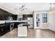 Well-equipped kitchen with modern appliances, stylish cabinetry, granite counters, and an island for prepping at 2090 S Dorsey Ln # 1037, Tempe, AZ 85282