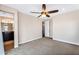This main bedroom features carpeted floors and a ceiling fan with lighting at 2090 S Dorsey Ln # 1037, Tempe, AZ 85282