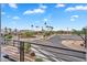 View of the neighborhood with palm trees, other greenery, walkways, parking, and well-maintained apartments at 2090 S Dorsey Ln # 1037, Tempe, AZ 85282